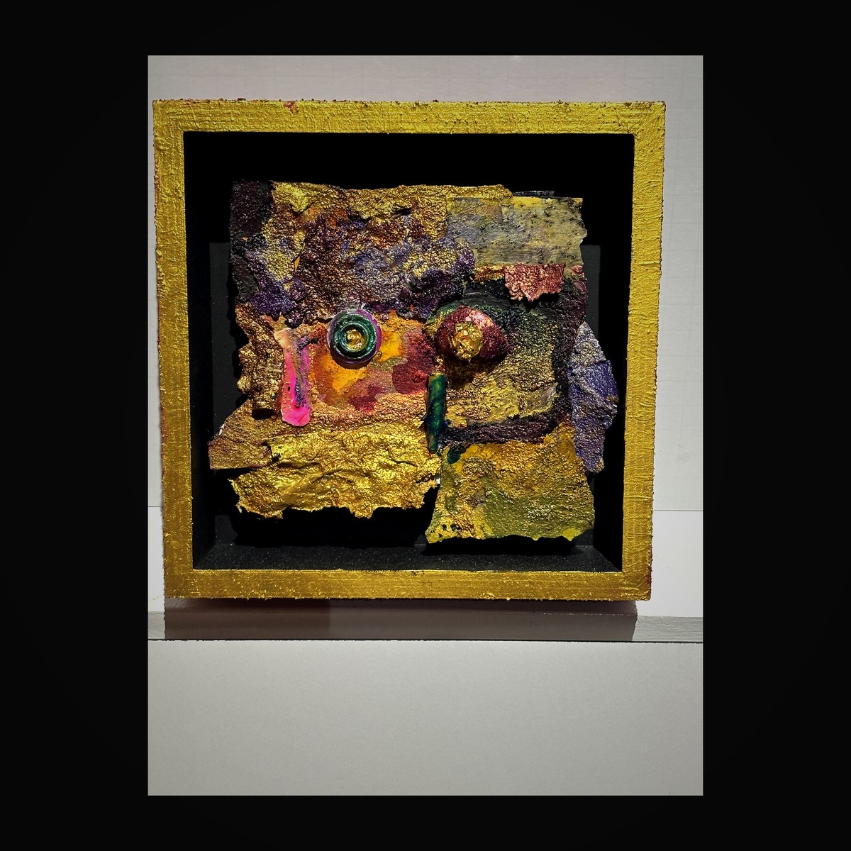 Shadow box with gold, purple, and emerald cloisonné enamel — a cosmic bloom of layered precious metals