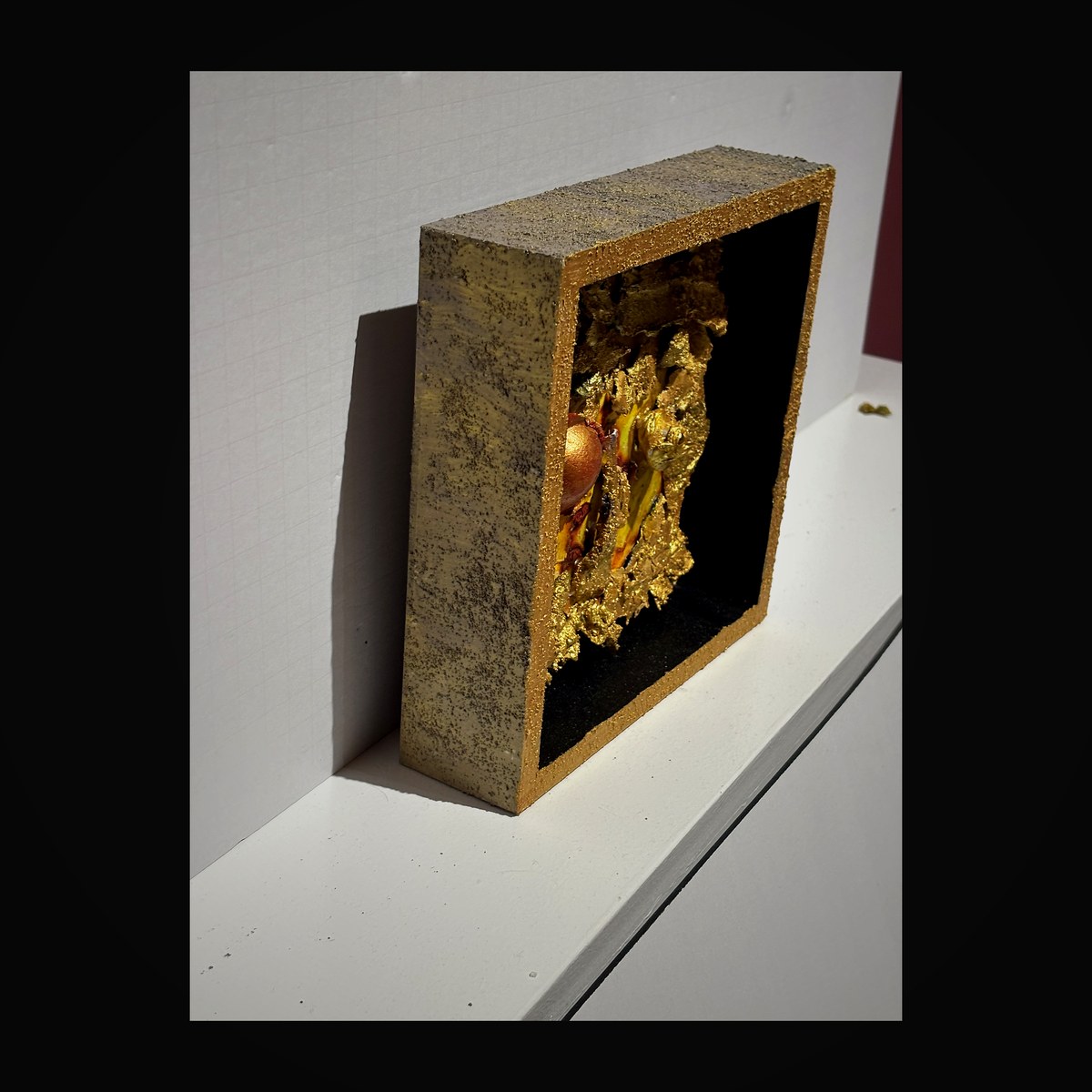 Golden horizon shadow box with warm amber tones